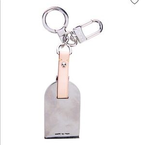 Louis Vuitton luggage tag bag charm NEW